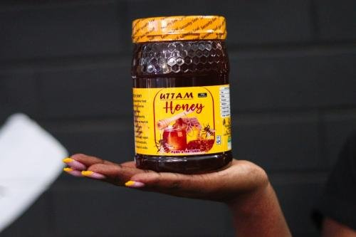 Jar of Uttam raw honey